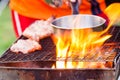 Barbecue in a simple way in wild, collect stones as grill Royalty Free Stock Photo