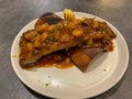 Barbecue spareribs serving on white plate