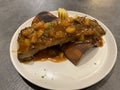 Barbecue spareribs serving on white plate