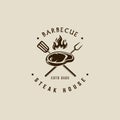 barbecue steak logo vintage vector illustration template icon graphic design. BBQ grill with flame and meat spatula and fork sign Royalty Free Stock Photo