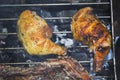 Barbecue two fried chicken legs on the grill Royalty Free Stock Photo