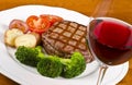 Barbecued Beef Steak and a Glass of Red Wine #2 Royalty Free Stock Photo