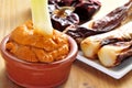 Barbecued calcots, sweet onions, and romesco sauce typical of Ca Royalty Free Stock Photo