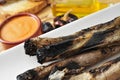 Barbecued calcots, sweet onions, and romesco sauce typical of Ca Royalty Free Stock Photo