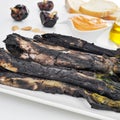 Barbecued calcots, sweet onions, and romesco sauce typical of Ca