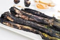 Barbecued calcots, sweet onions, and romesco sauce typical of Ca