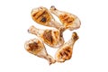 Barbecued Chicken leg drumstick, poultry meat Isolated on white background, top view. Royalty Free Stock Photo