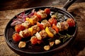 Barbecued kebabs with vegetables and meat Royalty Free Stock Photo