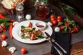 Barbecued marinated turkey or chicken meat shish kebab skewers with ketchup sauce and grilled vegetables on rustic wooden table Royalty Free Stock Photo