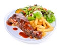 Barbecued pork ribs with Salad and French Fries