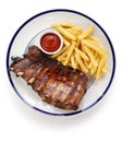 Barbecued pork spare ribs and french fries Royalty Free Stock Photo
