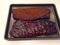Barbecued Smoked Pork Spareribs on a Tray Royalty Free Stock Photo
