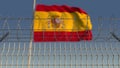 Barbed wire against waving flag of Spain. 3D rendering