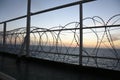 Barbed wire attached to the ship railings to protect the crew against piracy attack in the Gulf of Guinea in West Africa.