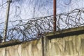 Barbed wire. Barbed wire on fence with blue sky to feel worrying. Royalty Free Stock Photo