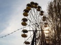 Barbed wire and cabins carousel wheel in an abandoned amusement park in Chernobyl Royalty Free Stock Photo