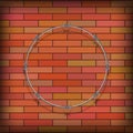 Barbed Wire Circle on Red Brick Background. Stylized Prison Concept. Symbol of Not Freedom. Metal Frame Round Royalty Free Stock Photo