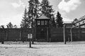 Barbed wire and the control tower in auschwitz Royalty Free Stock Photo