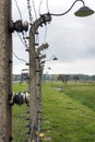 Barbed wire fence in Auschwitz II-Birkenau Concentration Camp in Poland. Royalty Free Stock Photo