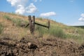 Barbed wire fence in a dirt field. Taken in Eastern Washington State in the Palouse Royalty Free Stock Photo