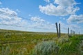 Barbed Wire Fence and Field Royalty Free Stock Photo