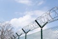 Barbed wire fence outside felony prison freedom stop trespassing security