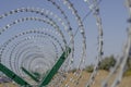 Barbed wire fence in receding perspective Royalty Free Stock Photo