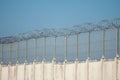 Barbed wire fence on sky background. Lost freedom and hope, crime and punishment concept Royalty Free Stock Photo