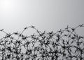 Barbed wire fencing. Fence made of wire with spikes. Black and white illustration to the holocaust. Console camp. Royalty Free Stock Photo