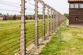 Barbed wire and guard towers around the Auschwitz-Birkenau concentration camp. Oswiecim, Poland, 16 May 2022 Royalty Free Stock Photo