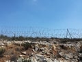 Barbed wire on hill, sign of occupied Palestine