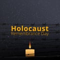 Barbed wire and one memorial candle, International Holocaust Remembrance Day poster, January 27