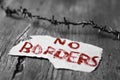 Barbed wire and text no borders Royalty Free Stock Photo