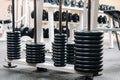 Barbell discs stacked in rows in the gym Royalty Free Stock Photo