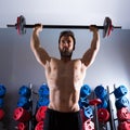 Barbell man workout fitness at weightlifting gym Royalty Free Stock Photo