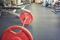 Barbell on floor in empty gym