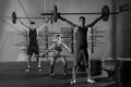 Barbell weight lifting group workout exercise gym Royalty Free Stock Photo