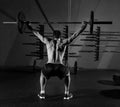 Barbell weight lifting man rear view workout gym Royalty Free Stock Photo