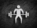 Barbell weightlifting bodybuilding symbol stone wall background
