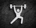 Barbell weightlifting training symbol stone wall background