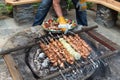Barbeque meat kebabs.Grilled kebabs cooking on metal skewers. Royalty Free Stock Photo