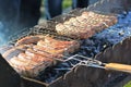 Barbeque sausages cooked in grill outdoor Royalty Free Stock Photo