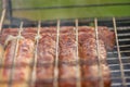 Barbeque sausages outdoors, selective focus