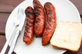 Barbeque sausages on a plate