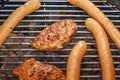 Barbeque sausages and pork chops Royalty Free Stock Photo