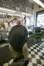 Barber cutting hair Royalty Free Stock Photo