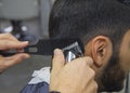 Barber cutting hair