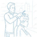 Barber making haircut to young man.