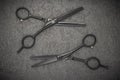 Barber Professional Tools. Haircut Fashion. Pair Of Professional Haircutting Scissors On Black Backgroud