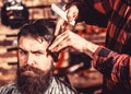Barber scissors, barber shop. Vintage barbershop, shaving. Man hairstylist. Beard man in barbershop. Hairstylist serving Royalty Free Stock Photo